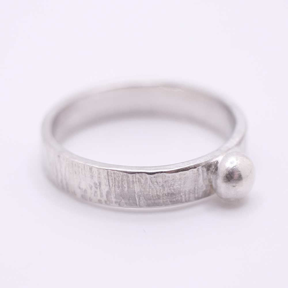 Bark Textured Ring with Silver Pebble