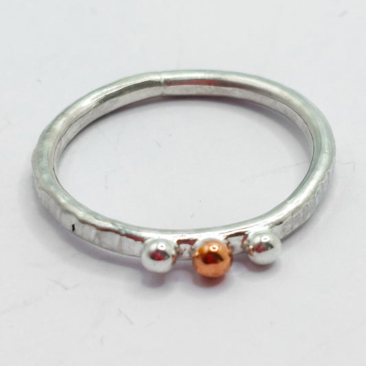 Silver and Copper Pebbles on Textured Ring